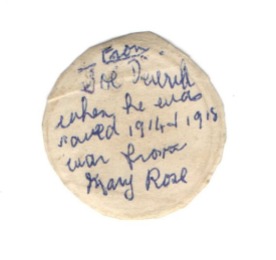 Reverse of Joe's Mary Rose penny, wife Nellie's notation